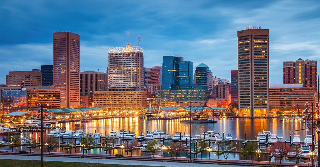 View on Baltimore skyline and Inner Harbor from Federal Hill at dusk